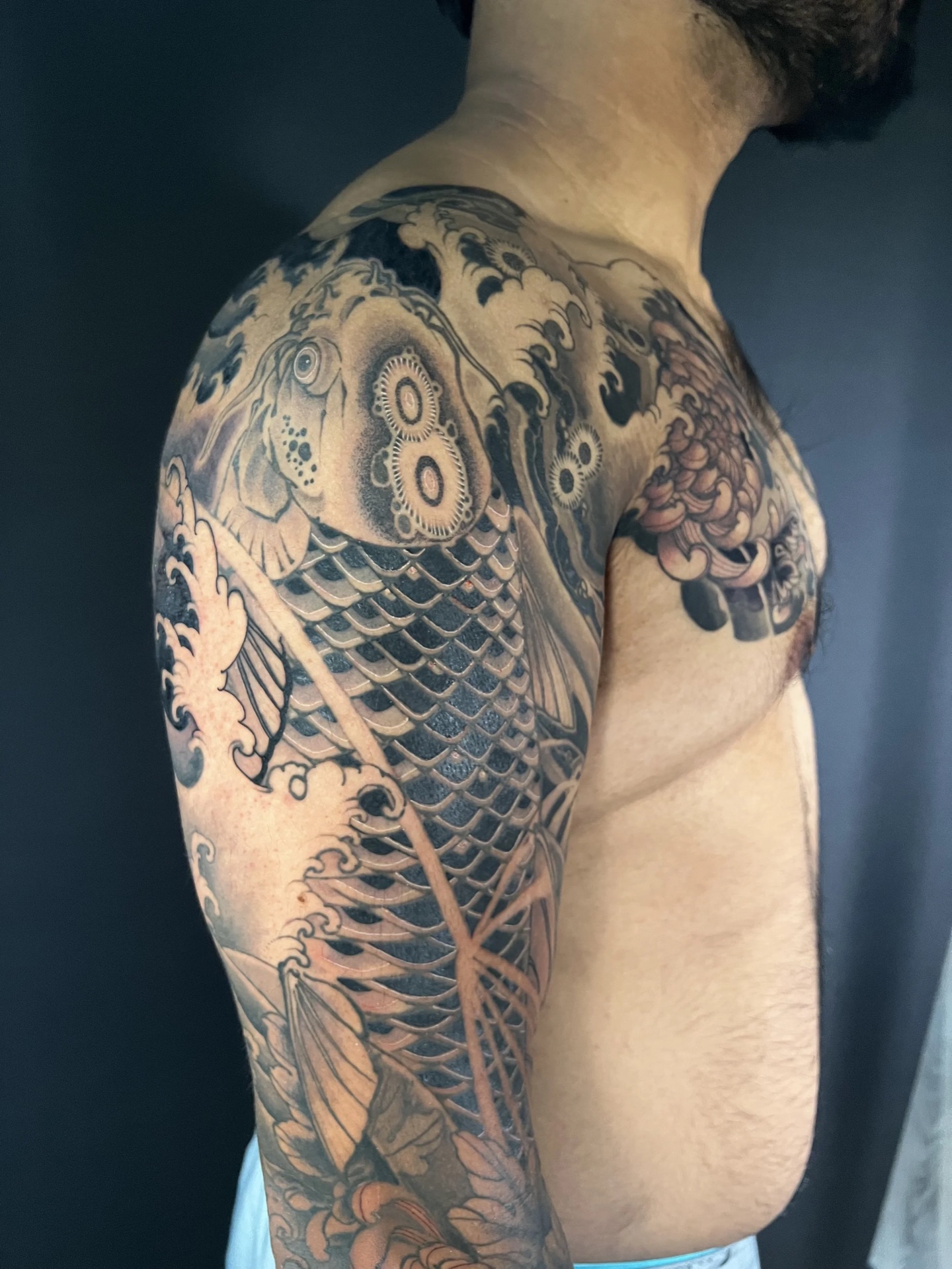 Black and grey koi sleeve by Levi Taylor, NEST Studio Melbourne